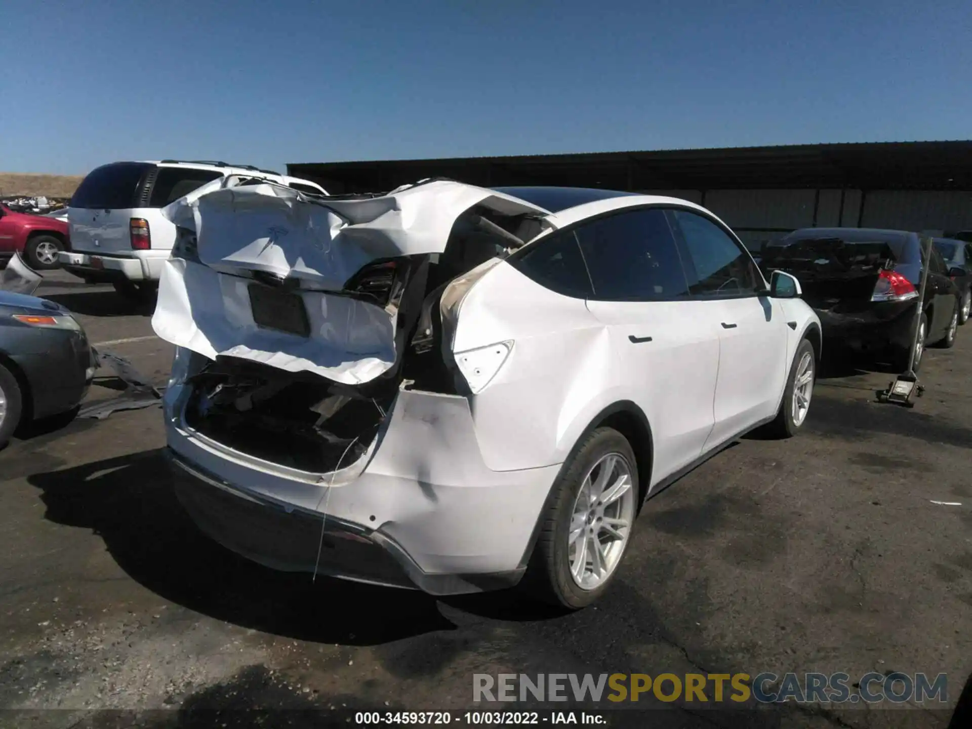 4 Photograph of a damaged car 5YJYGDEE0LF014688 TESLA MODEL Y 2020