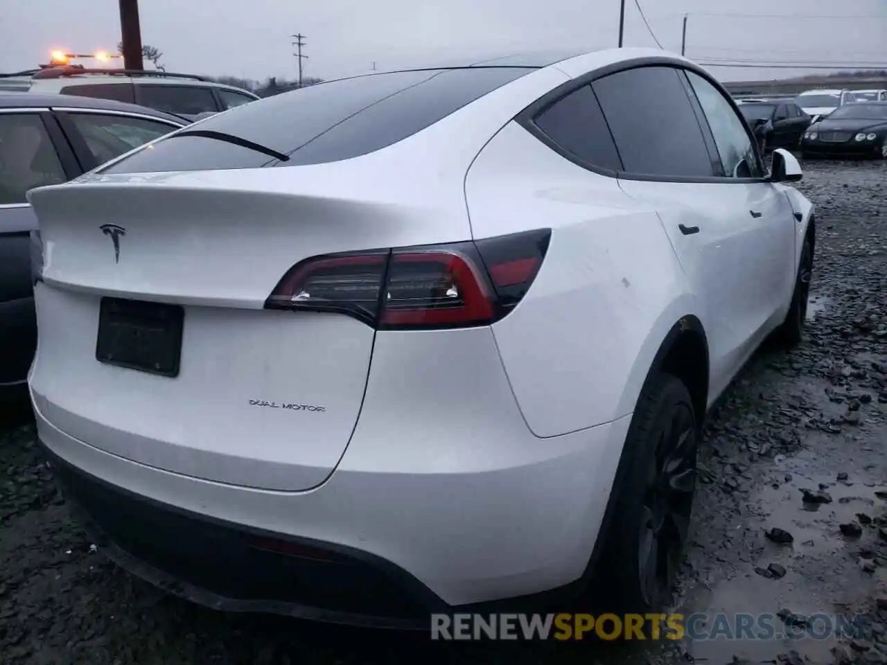 4 Photograph of a damaged car 5YJYGDEE0LF034052 TESLA MODEL Y 2020