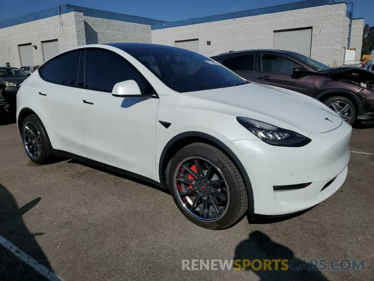 4 Photograph of a damaged car 5YJYGDEE1LF012996 TESLA MODEL Y 2020