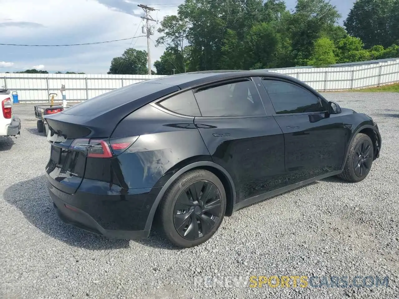 4 Photograph of a damaged car 5YJYGDEE1LF035193 TESLA MODEL Y 2020