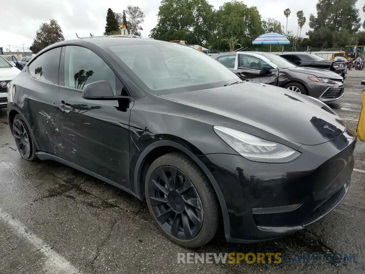 4 Photograph of a damaged car 5YJYGDEE2LF018466 TESLA MODEL Y 2020