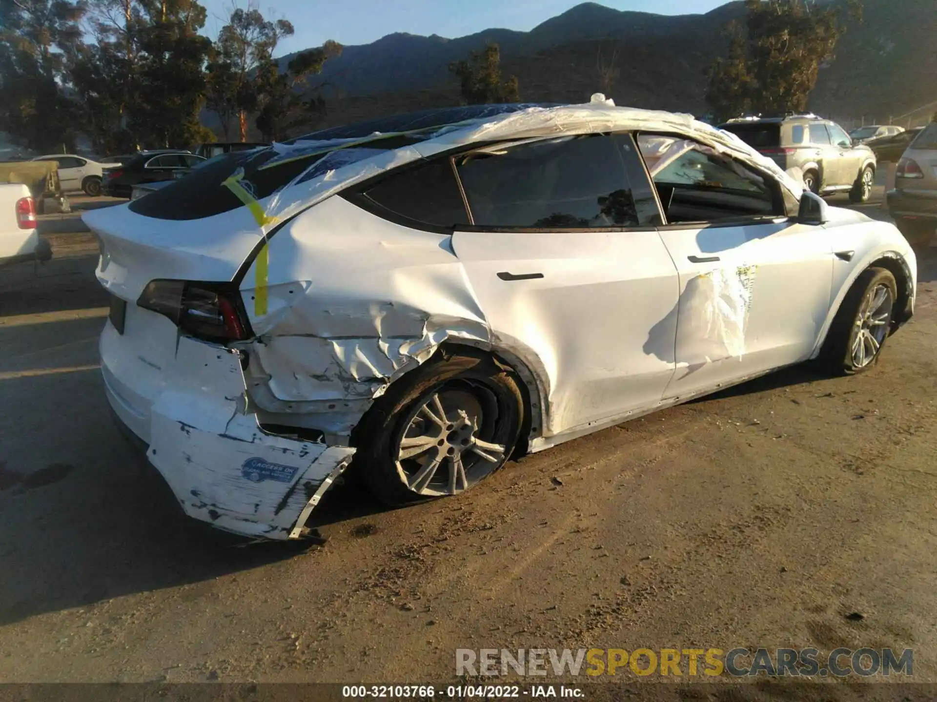 4 Photograph of a damaged car 5YJYGDEE5LF026612 TESLA MODEL Y 2020