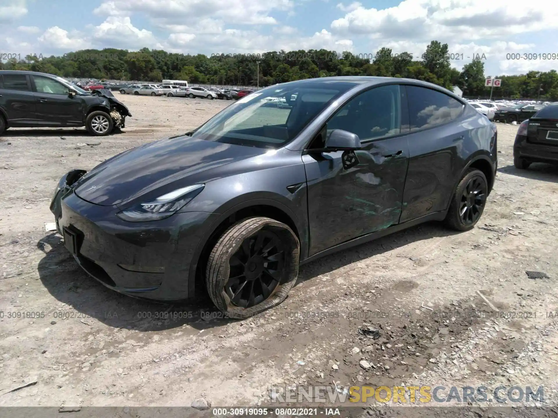 2 Photograph of a damaged car 5YJYGDEE5LF048562 TESLA MODEL Y 2020