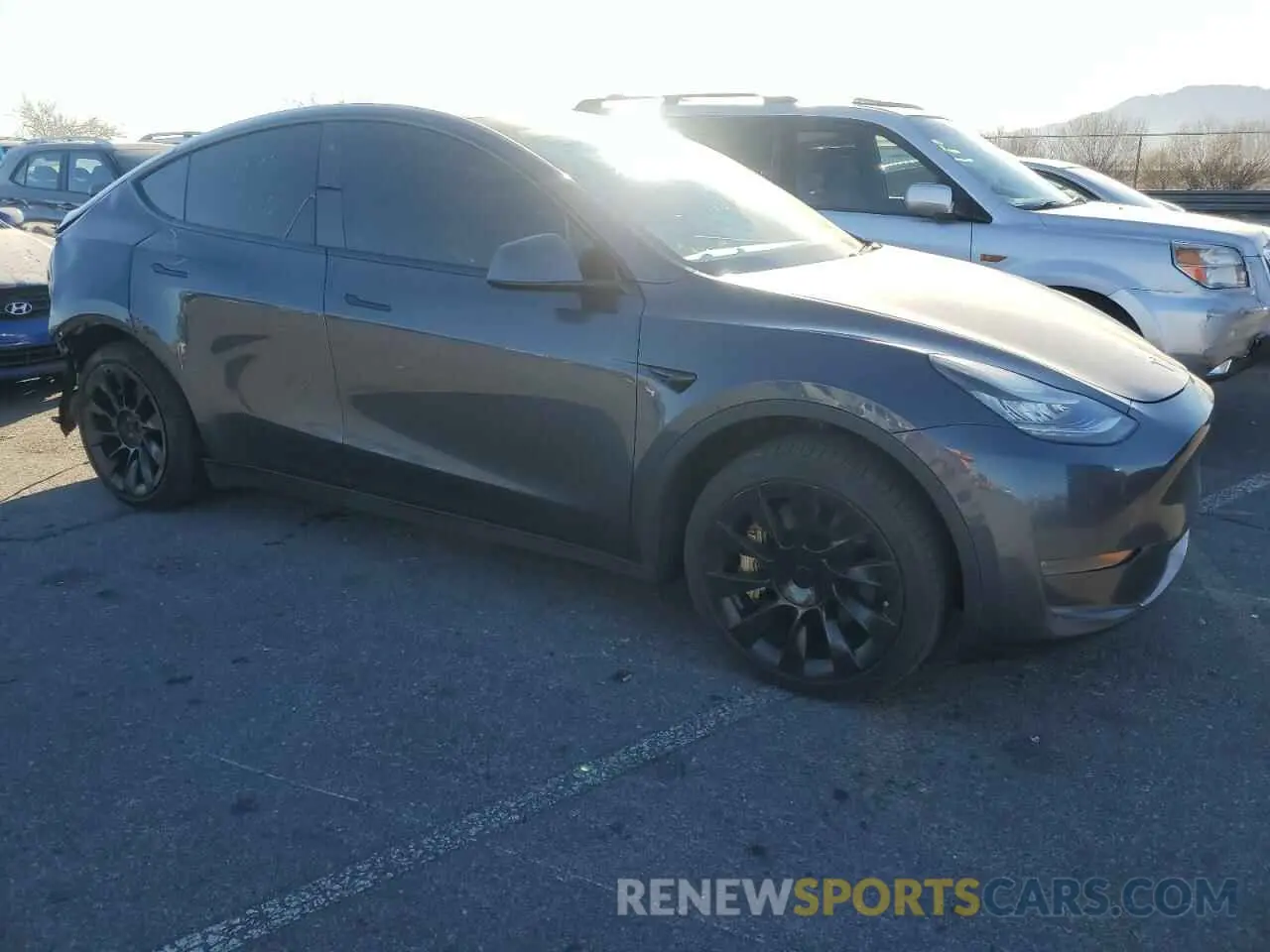 4 Photograph of a damaged car 5YJYGDEE7LF042052 TESLA MODEL Y 2020