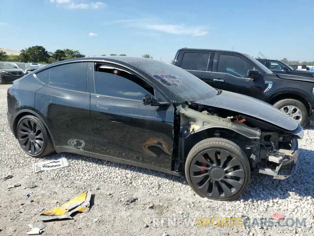 4 Photograph of a damaged car 5YJYGDEF2LF049855 TESLA MODEL Y 2020