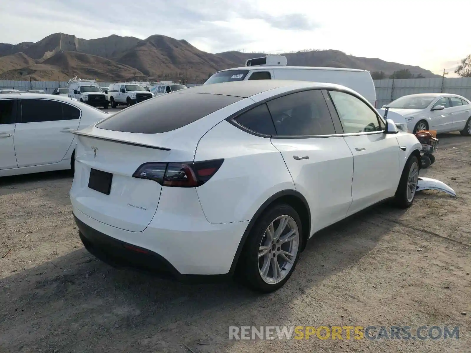 4 Photograph of a damaged car 5YJYGDEF6LF002568 TESLA MODEL Y 2020