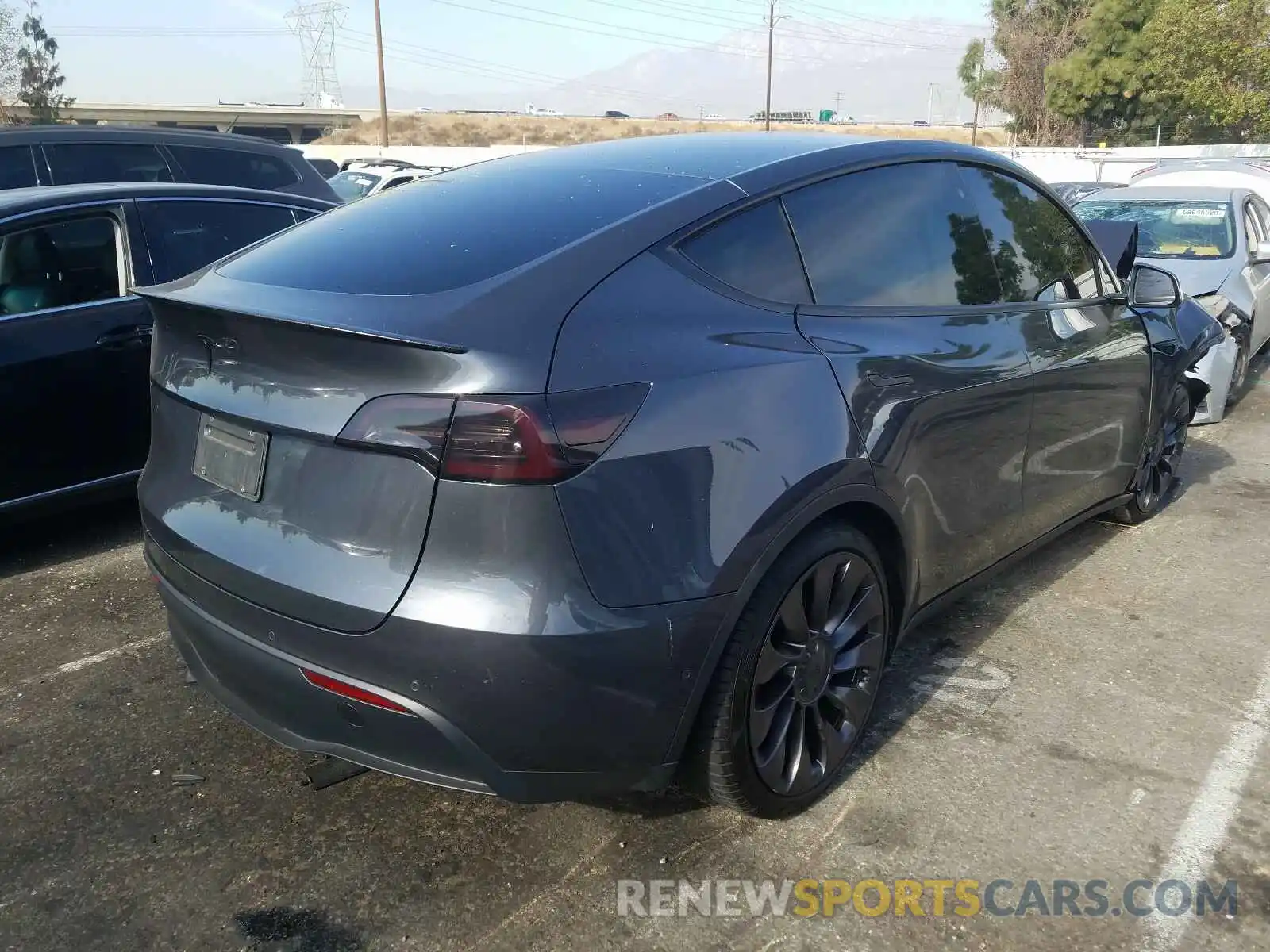 4 Photograph of a damaged car 5YJYGDEF7LF003311 TESLA MODEL Y 2020