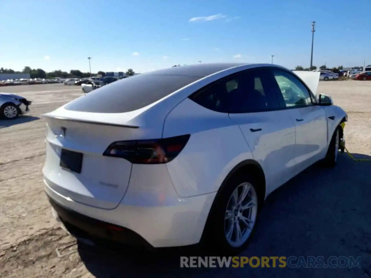 4 Photograph of a damaged car 5YJYGDEF7LF018892 TESLA MODEL Y 2020