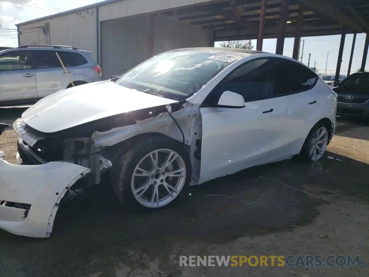 1 Photograph of a damaged car 5YJYGAED0MF142727 TESLA MODEL Y 2021