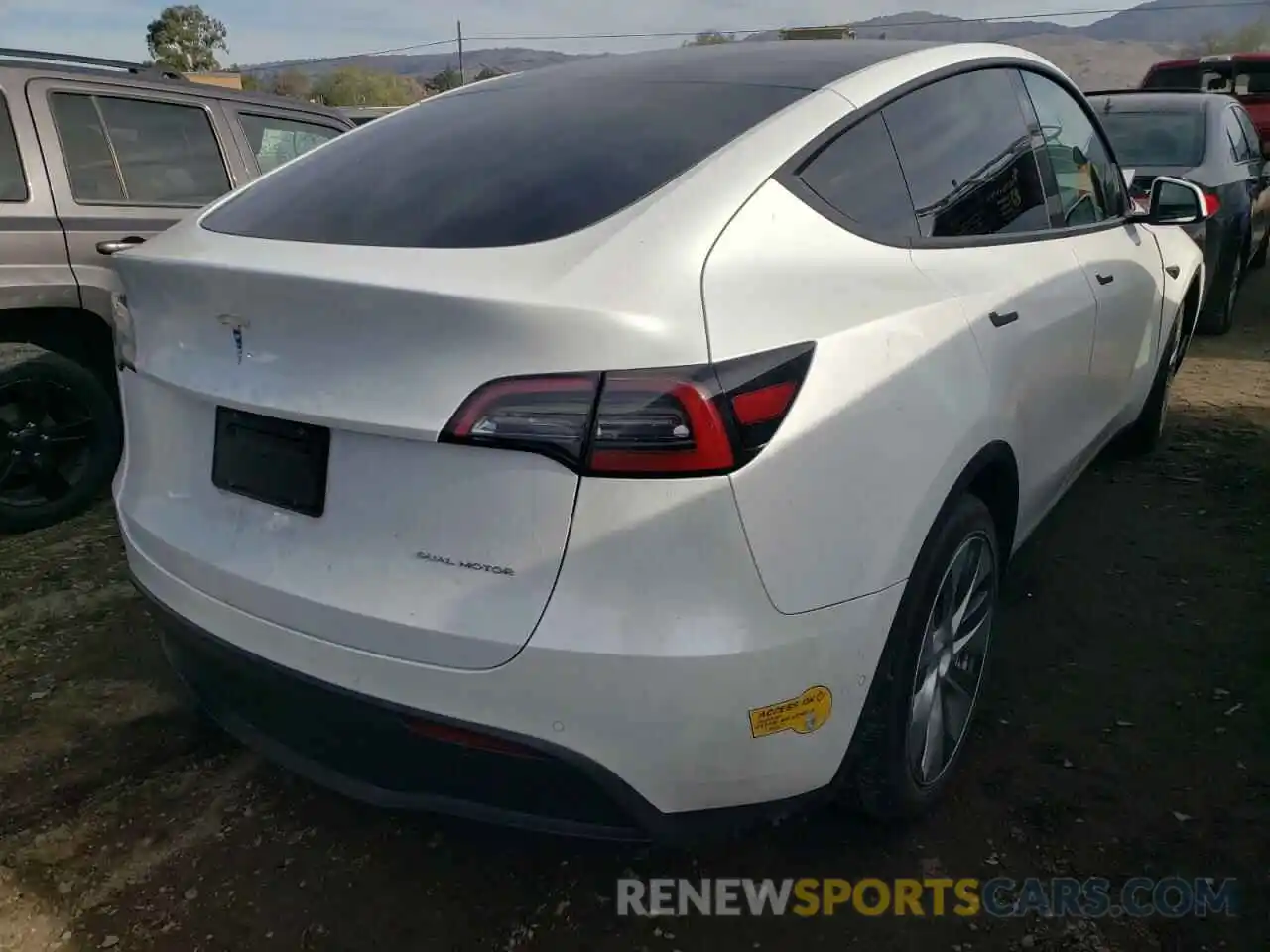 4 Photograph of a damaged car 5YJYGAEE0MF159262 TESLA MODEL Y 2021