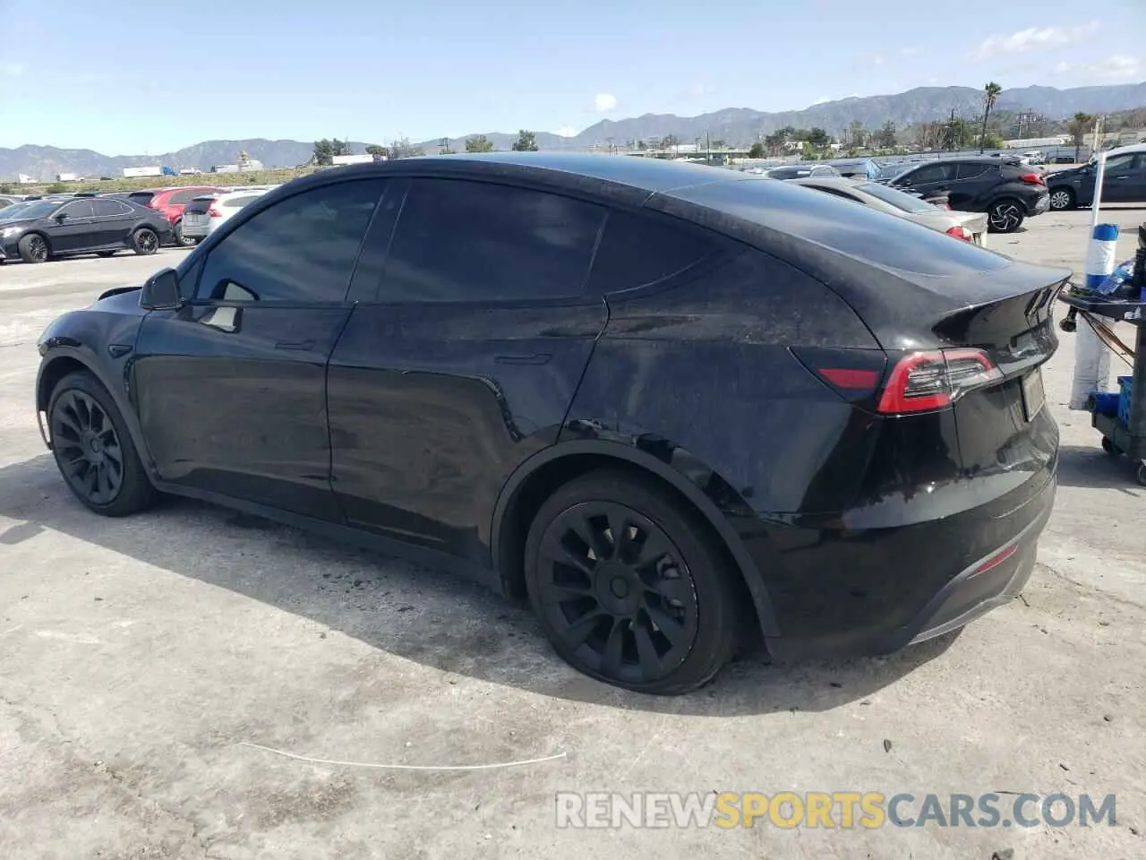 2 Photograph of a damaged car 5YJYGAEE0MF203308 TESLA MODEL Y 2021