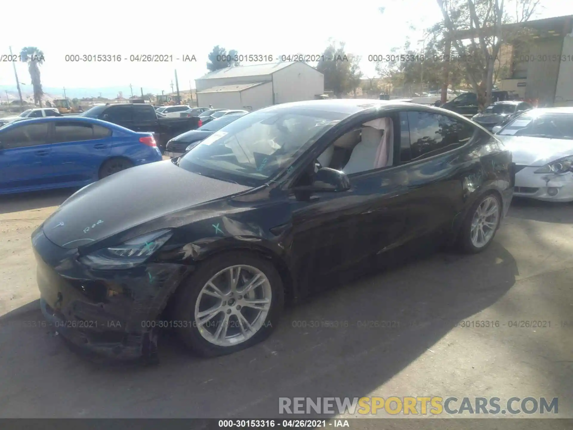 2 Photograph of a damaged car 5YJYGAEE1MF157603 TESLA MODEL Y 2021