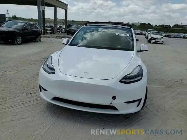 13 Photograph of a damaged car 5YJYGAEE1MF186602 TESLA MODEL Y 2021