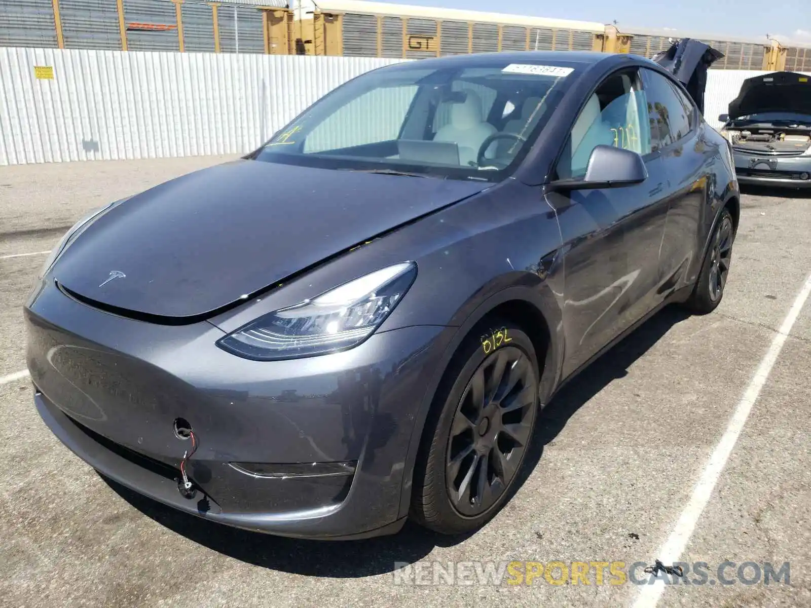 2 Photograph of a damaged car 5YJYGAEE3MF153939 TESLA MODEL Y 2021