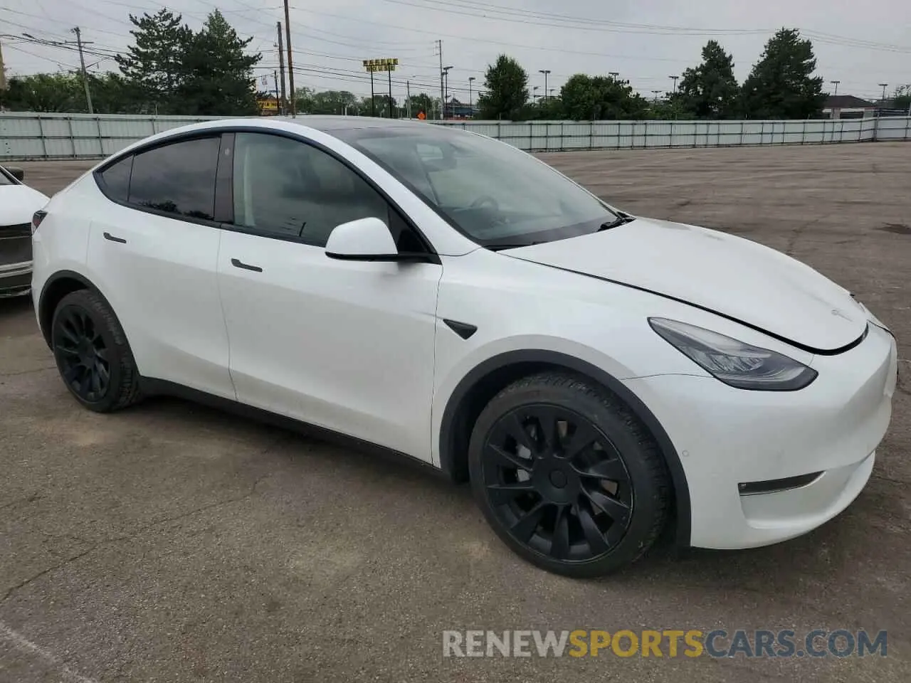 4 Photograph of a damaged car 5YJYGAEE3MF188366 TESLA MODEL Y 2021