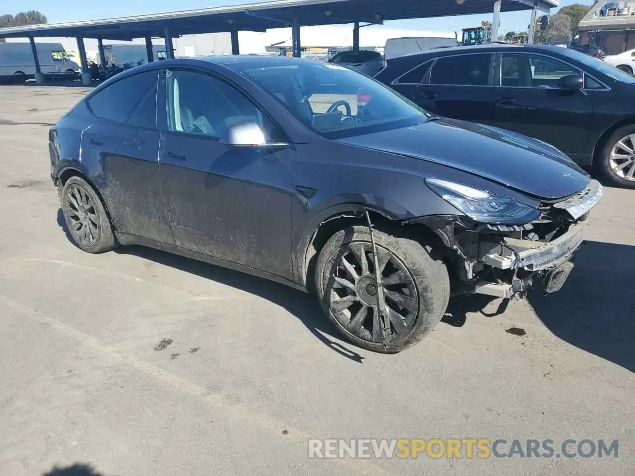 4 Photograph of a damaged car 5YJYGAEE4MF160057 TESLA MODEL Y 2021