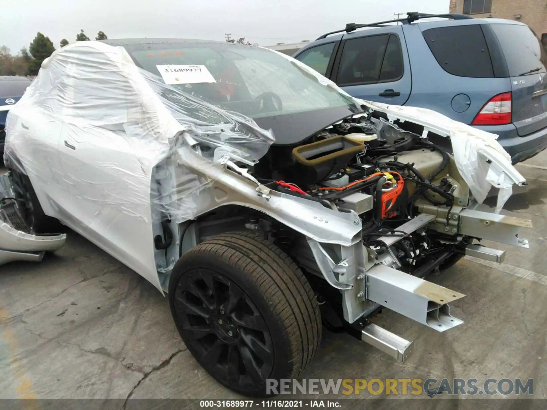 1 Photograph of a damaged car 5YJYGAEE5MF219052 TESLA MODEL Y 2021