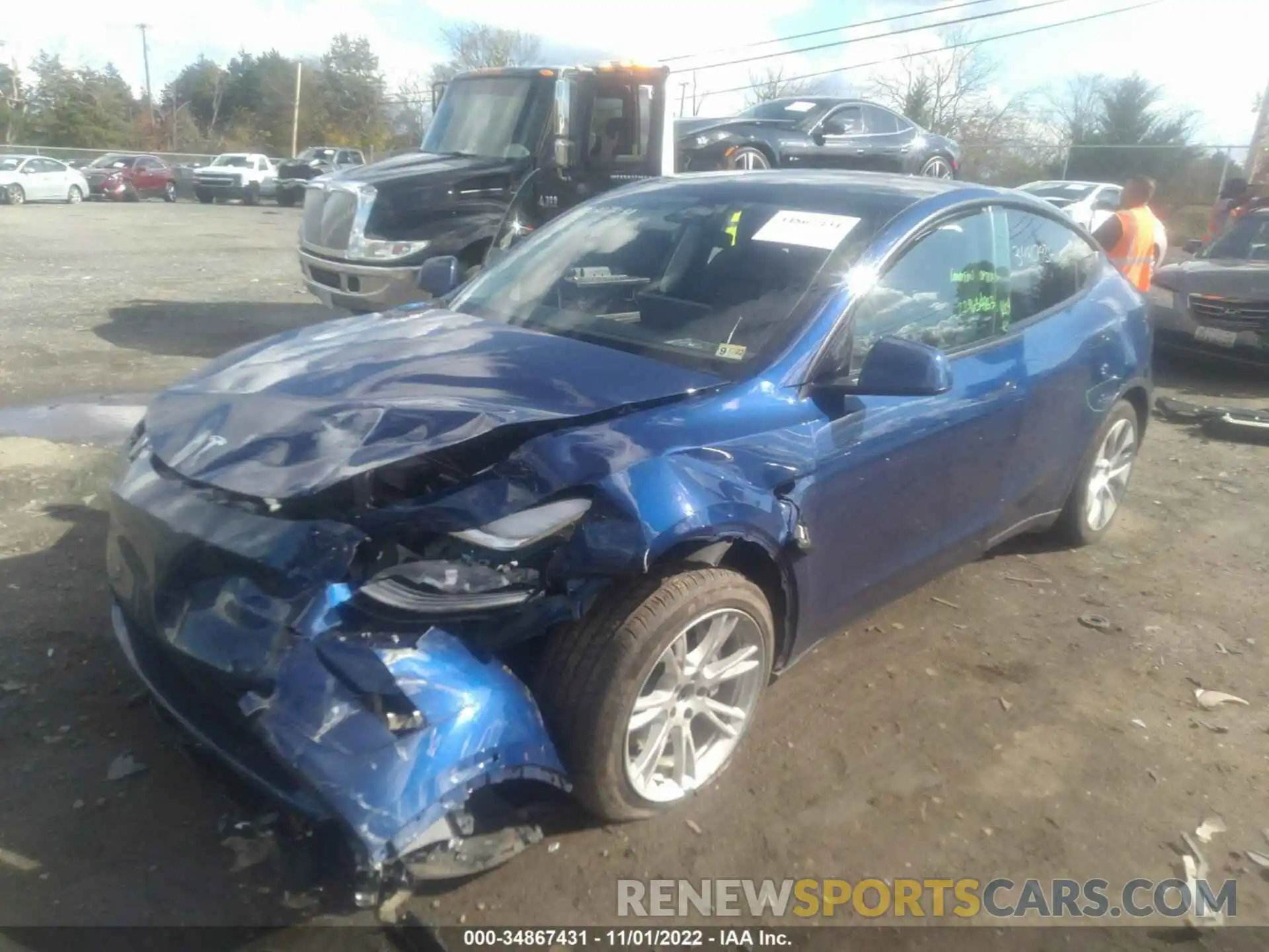 2 Photograph of a damaged car 5YJYGAEE5MF257946 TESLA MODEL Y 2021