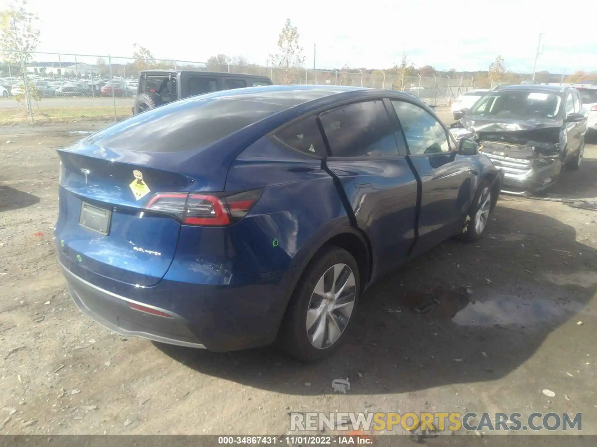 4 Photograph of a damaged car 5YJYGAEE5MF257946 TESLA MODEL Y 2021