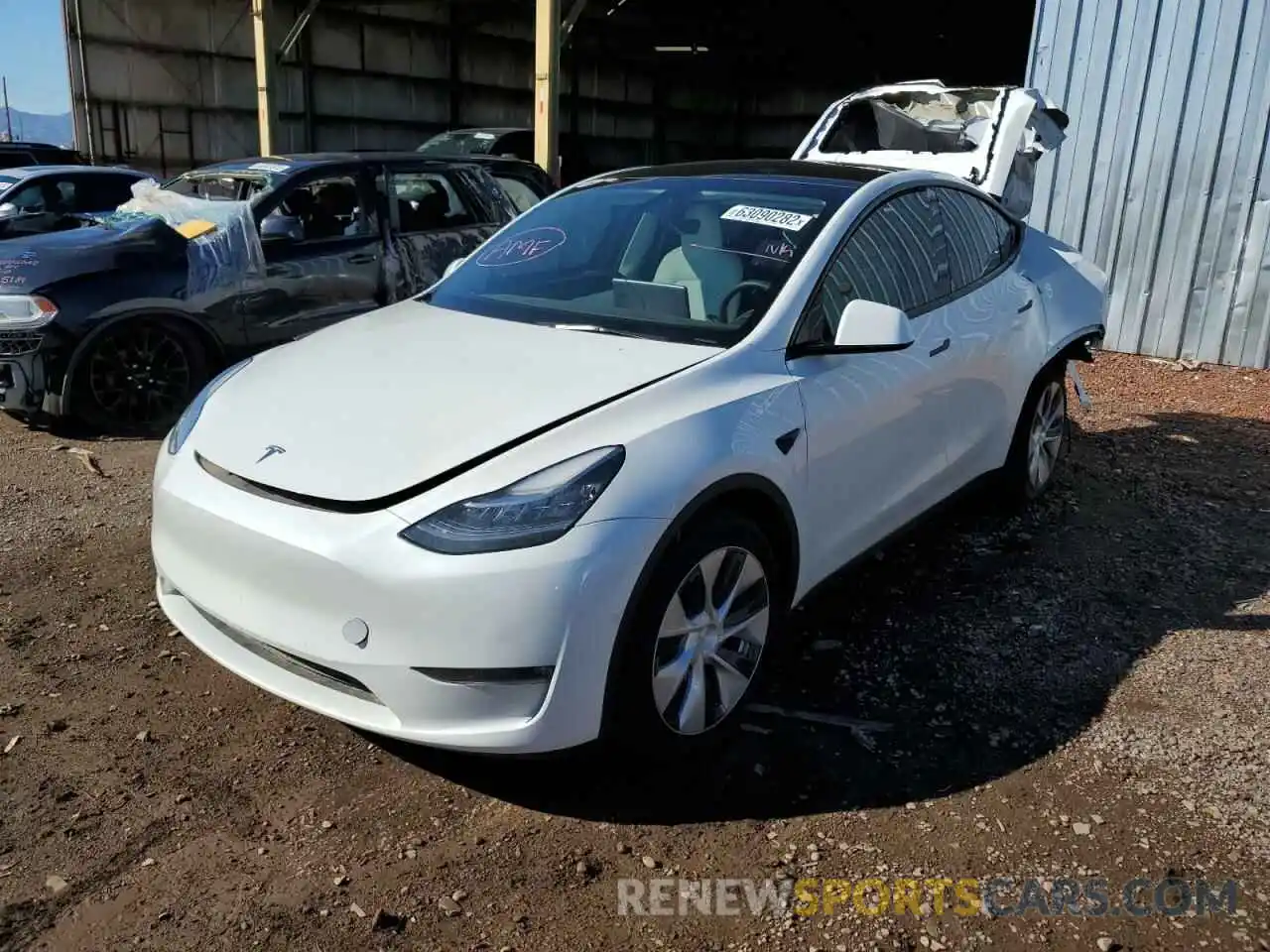 2 Photograph of a damaged car 5YJYGAEE6MF211395 TESLA MODEL Y 2021