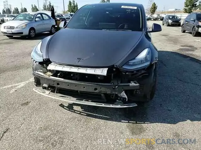 11 Photograph of a damaged car 5YJYGAEE6MF244347 TESLA MODEL Y 2021
