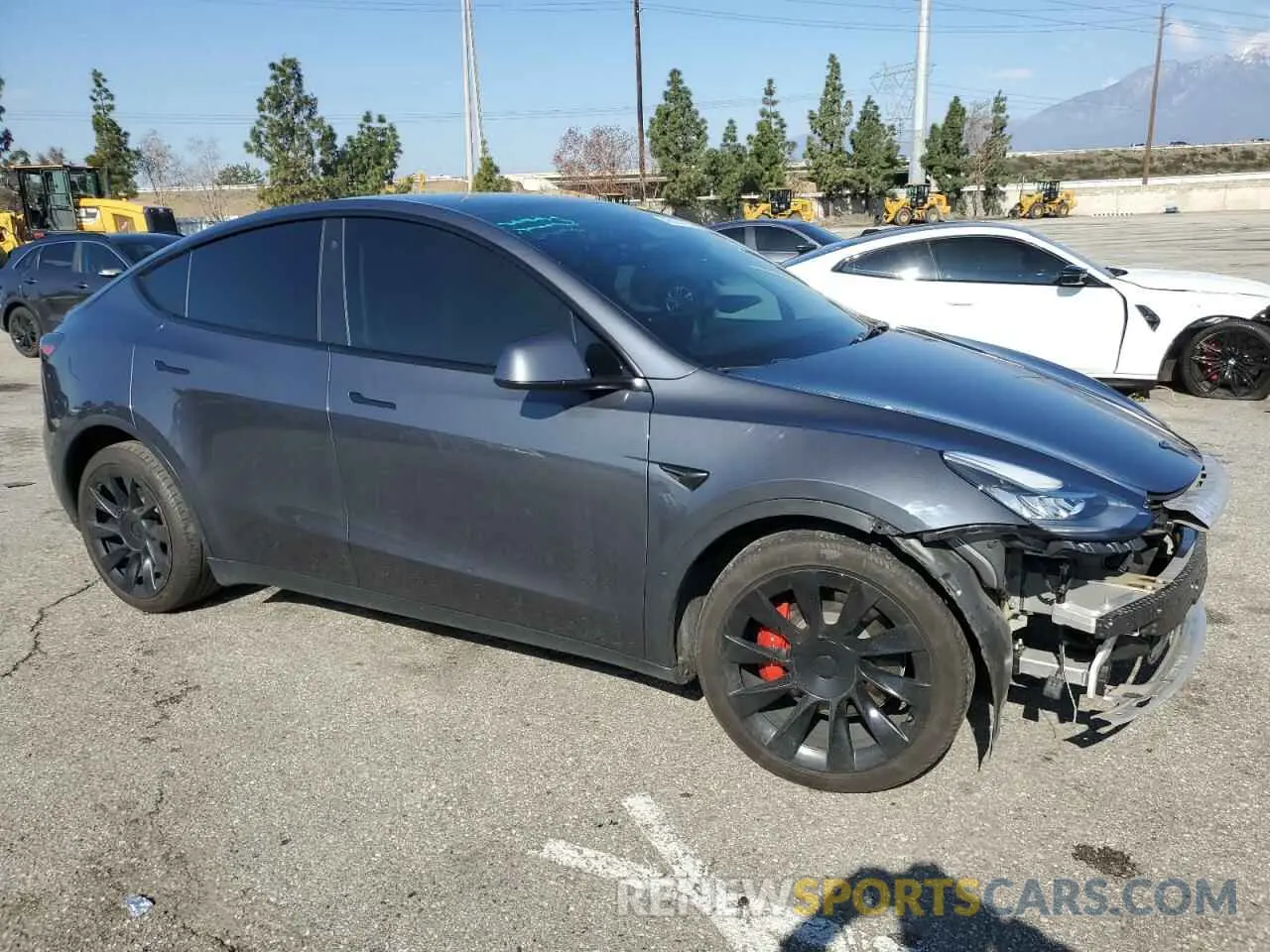 4 Photograph of a damaged car 5YJYGAEE6MF244347 TESLA MODEL Y 2021
