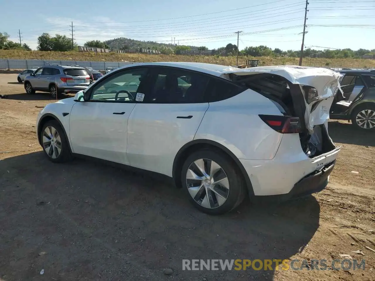 2 Photograph of a damaged car 5YJYGAEE8MF192137 TESLA MODEL Y 2021