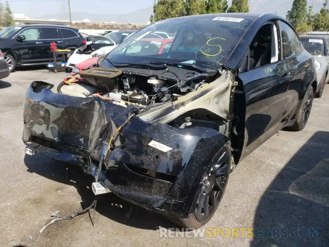 2 Photograph of a damaged car 5YJYGAEE8MF214086 TESLA MODEL Y 2021