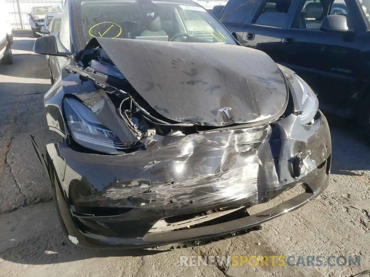 9 Photograph of a damaged car 5YJYGAEEXMF112594 TESLA MODEL Y 2021