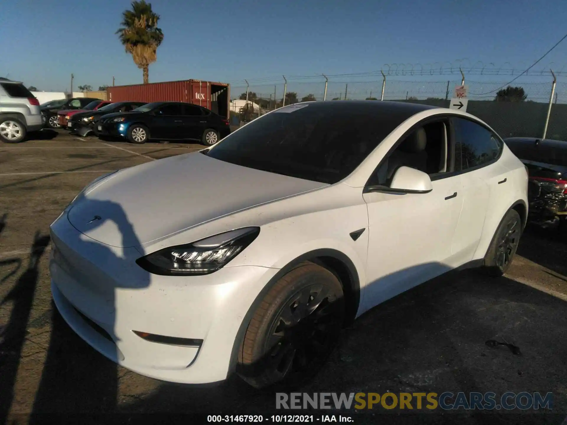 2 Photograph of a damaged car 5YJYGAEEXMF218477 TESLA MODEL Y 2021