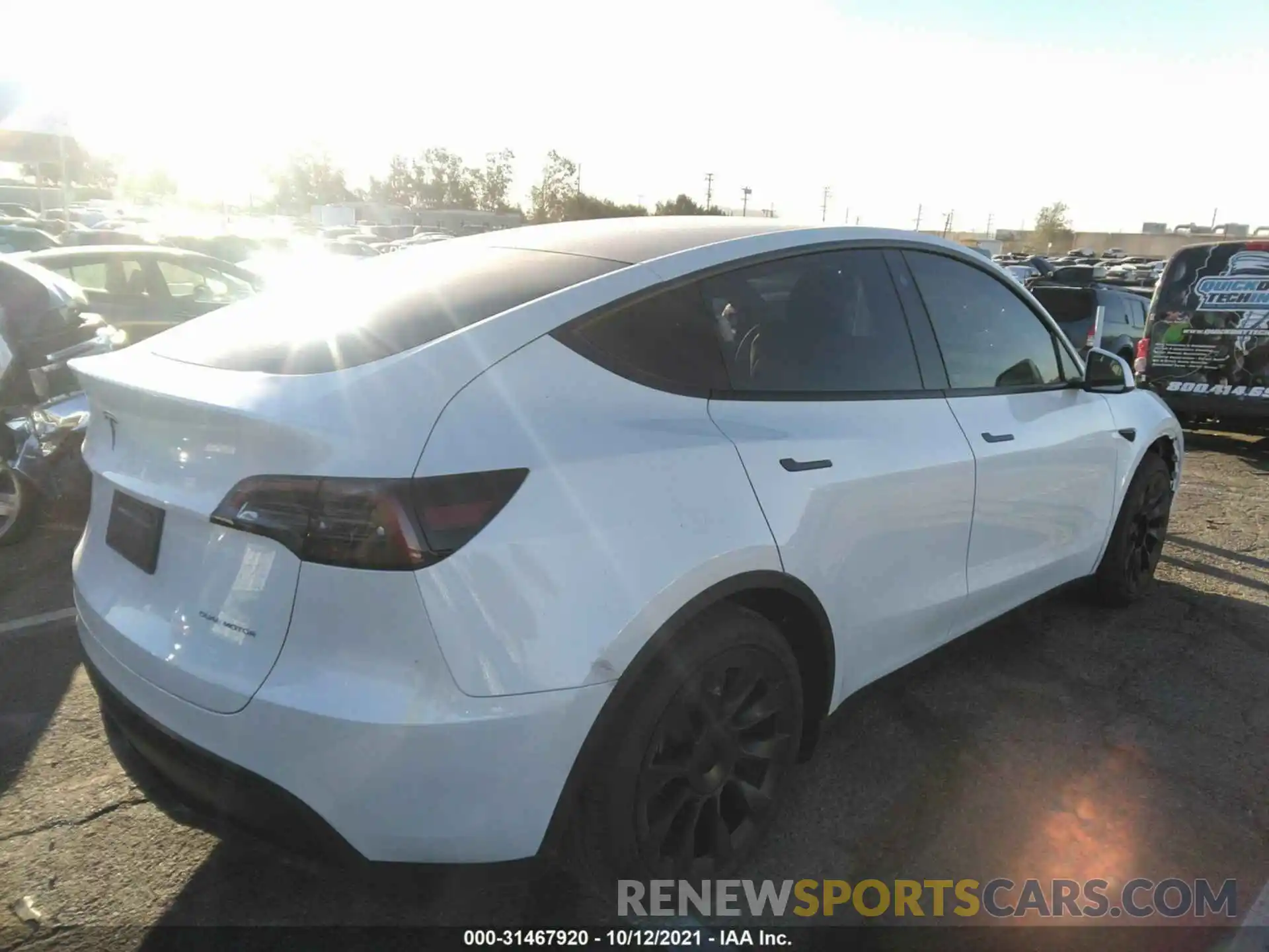 4 Photograph of a damaged car 5YJYGAEEXMF218477 TESLA MODEL Y 2021