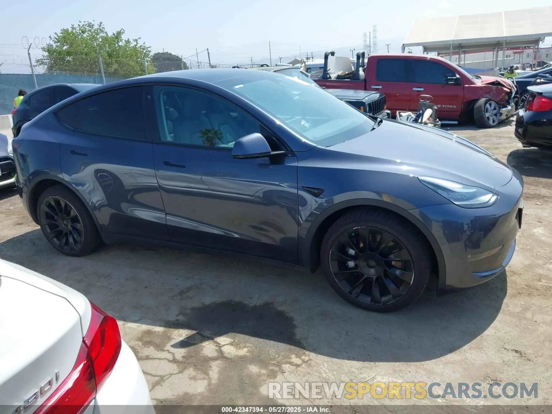 13 Photograph of a damaged car 5YJYGAEEXMF299450 TESLA MODEL Y 2021