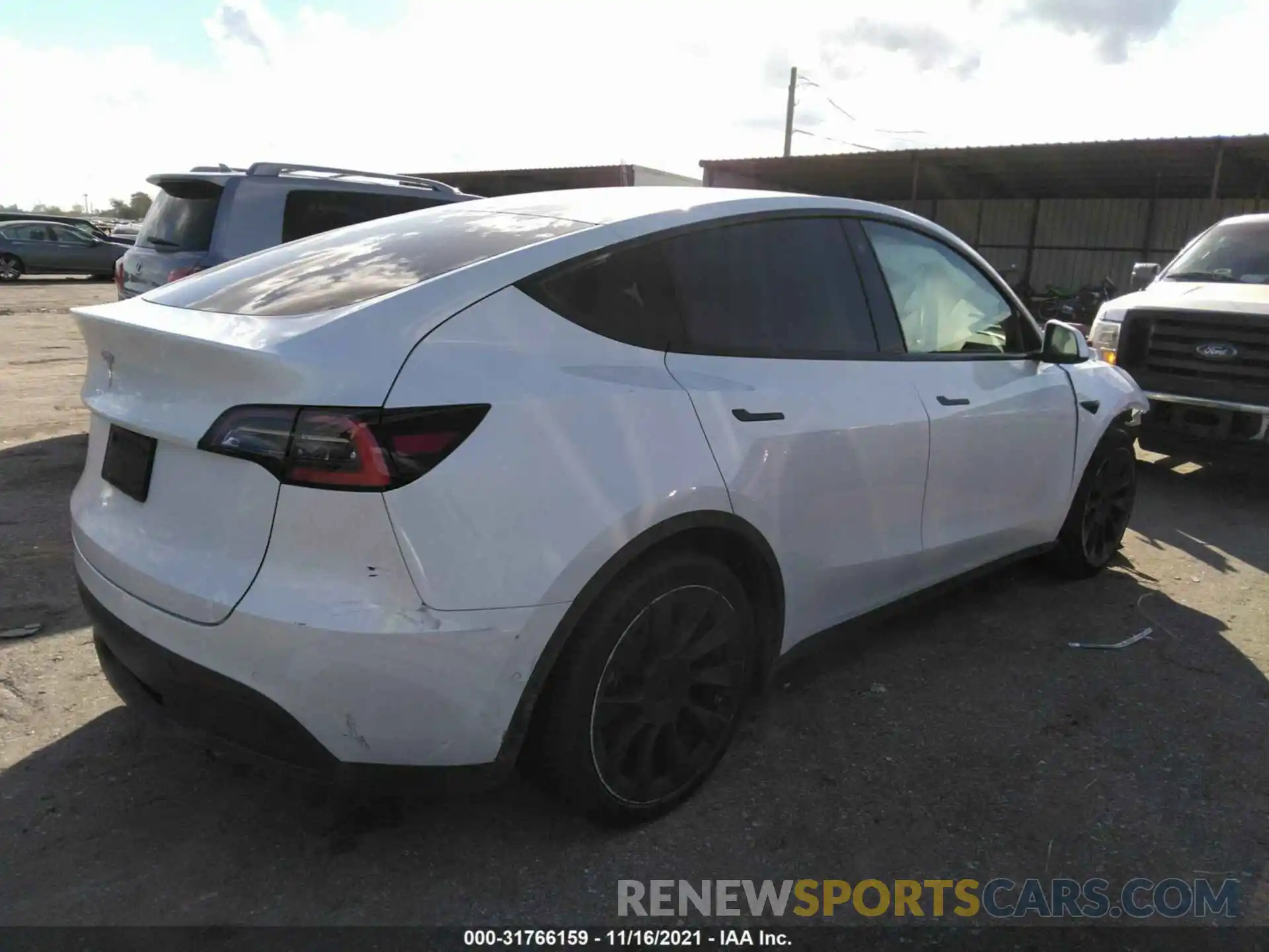 4 Photograph of a damaged car 5YJYGDED4MF118268 TESLA MODEL Y 2021