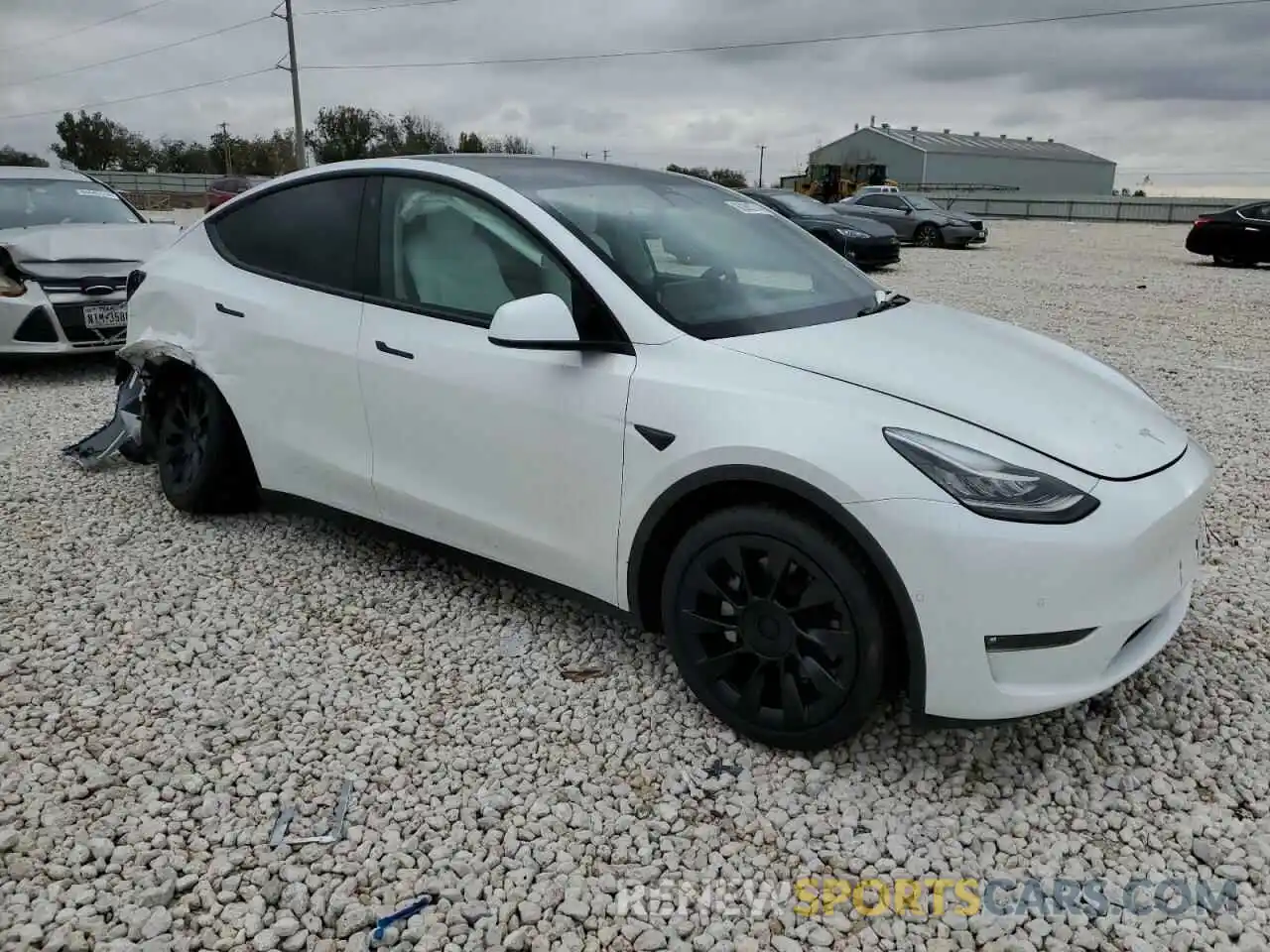 4 Photograph of a damaged car 5YJYGDED7MF121830 TESLA MODEL Y 2021