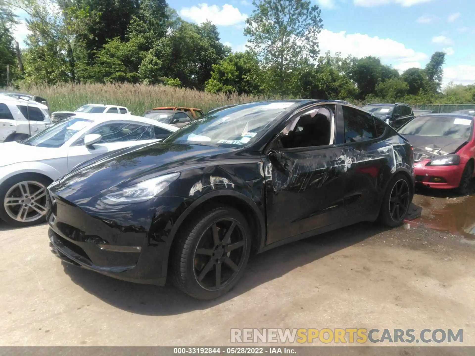 2 Photograph of a damaged car 5YJYGDED8MF118306 TESLA MODEL Y 2021