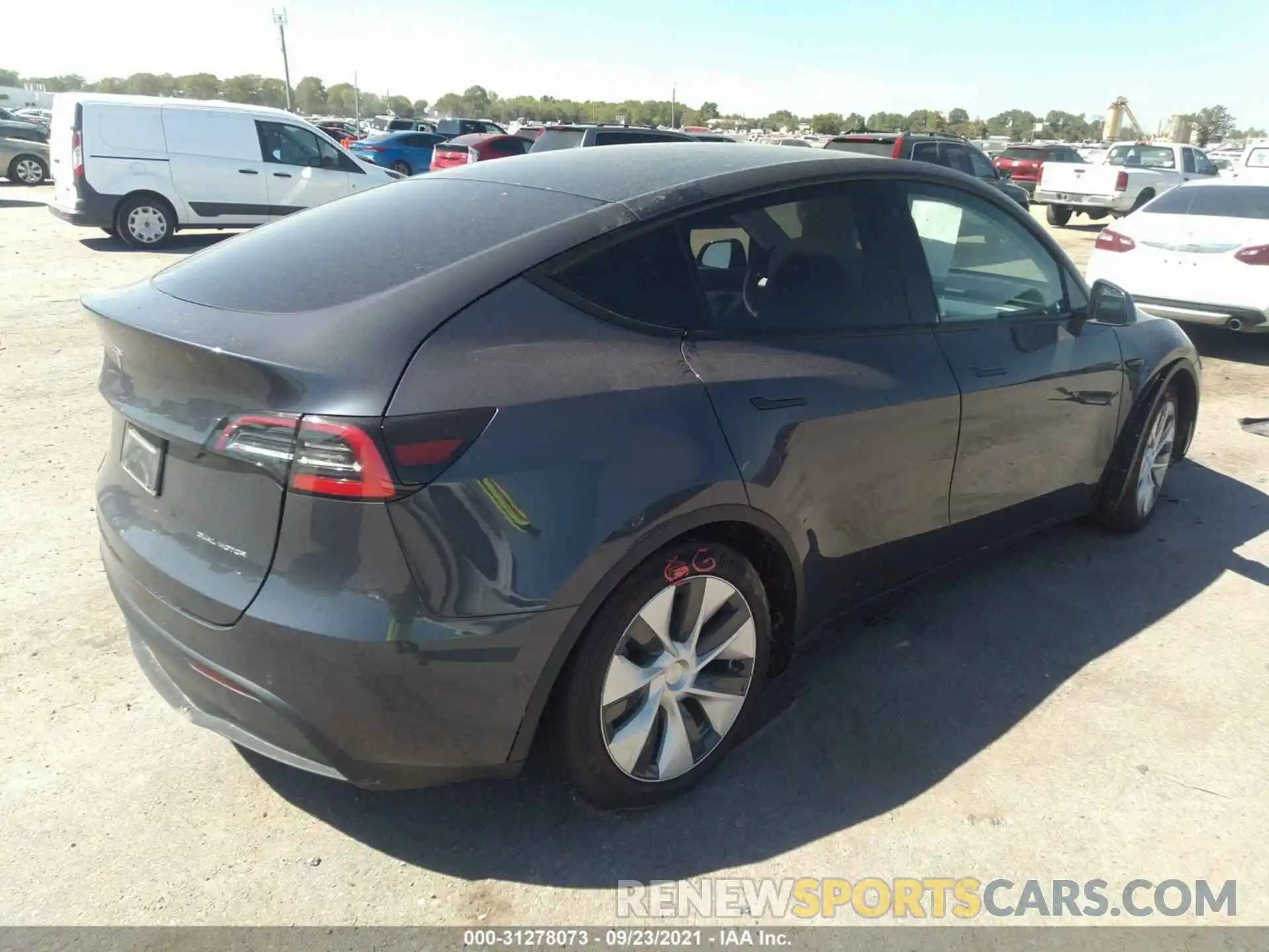 4 Photograph of a damaged car 5YJYGDEE0MF064749 TESLA MODEL Y 2021