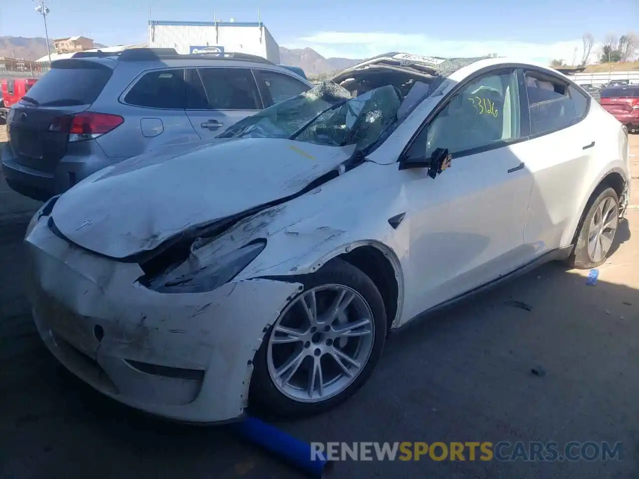 2 Photograph of a damaged car 5YJYGDEE0MF069630 TESLA MODEL Y 2021