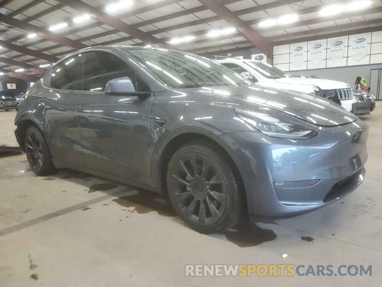 4 Photograph of a damaged car 5YJYGDEE0MF076660 TESLA MODEL Y 2021
