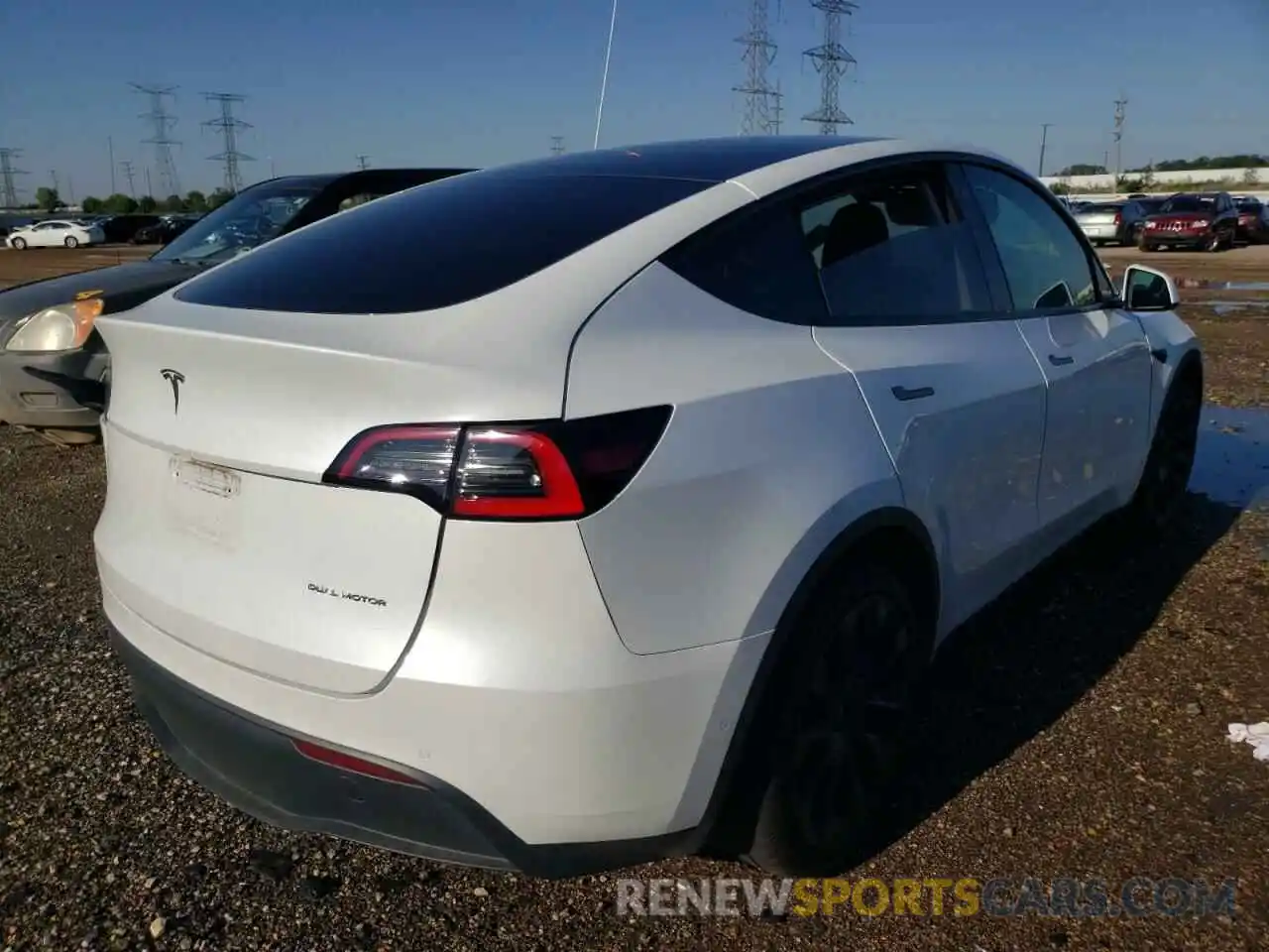 4 Photograph of a damaged car 5YJYGDEE0MF084435 TESLA MODEL Y 2021