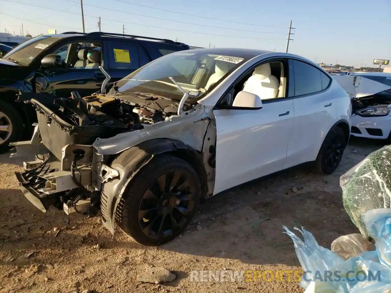 1 Photograph of a damaged car 5YJYGDEE0MF119149 TESLA MODEL Y 2021