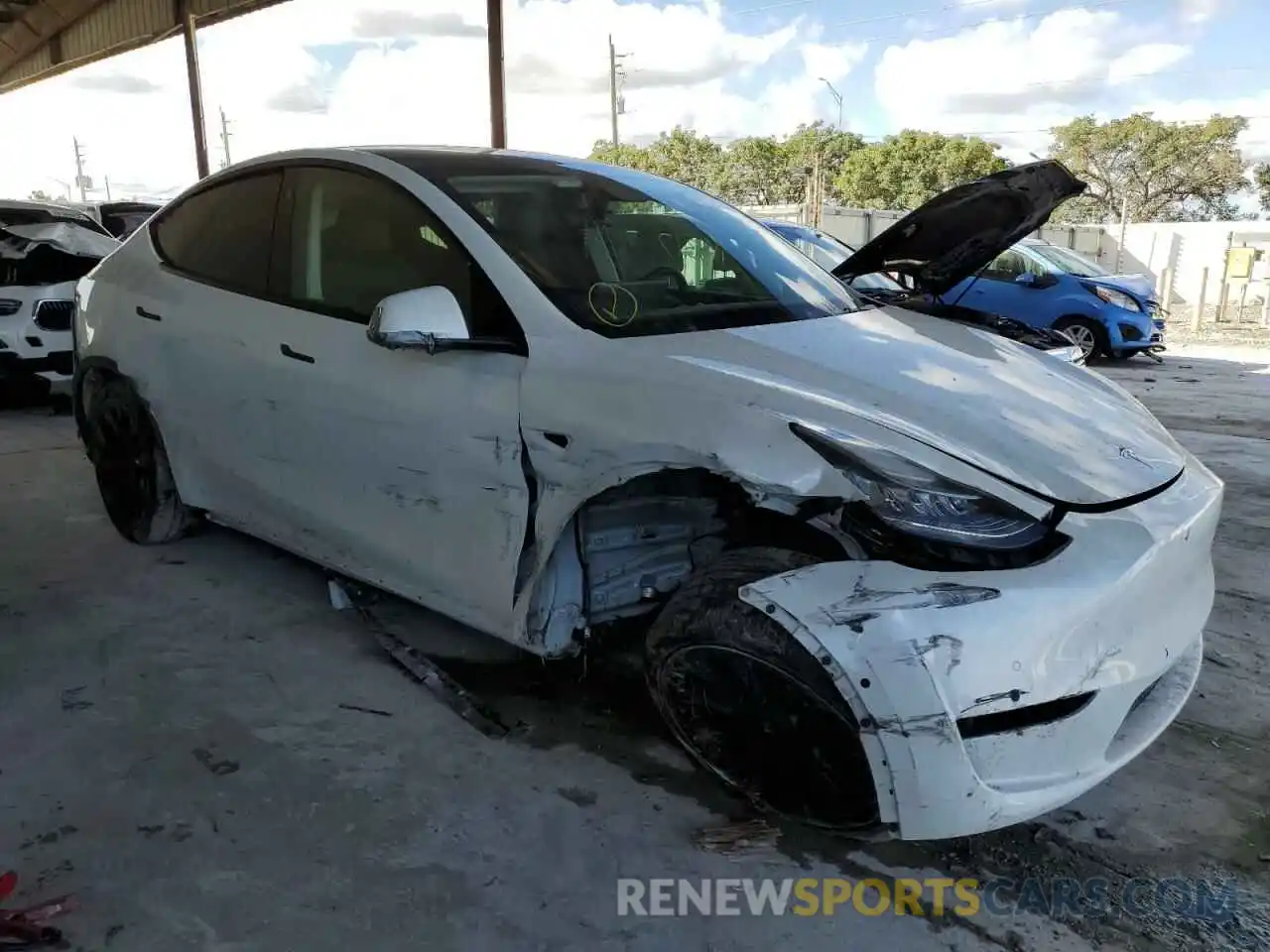 4 Photograph of a damaged car 5YJYGDEE0MF140034 TESLA MODEL Y 2021