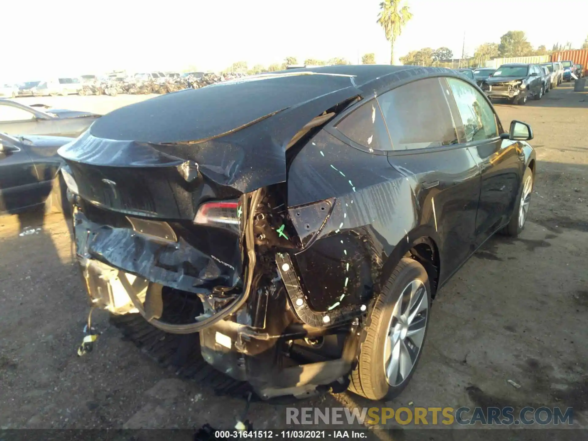 4 Photograph of a damaged car 5YJYGDEE0MF231806 TESLA MODEL Y 2021