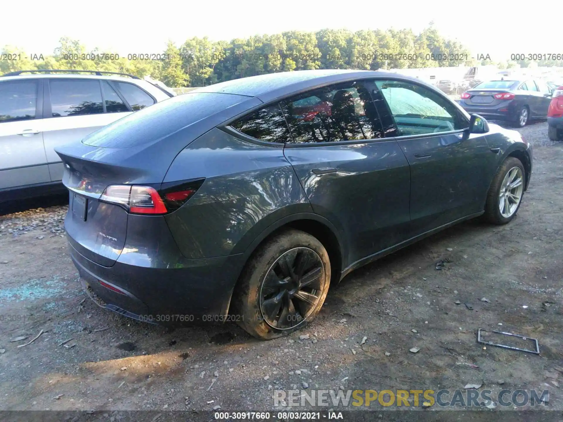 4 Photograph of a damaged car 5YJYGDEE1MF067174 TESLA MODEL Y 2021