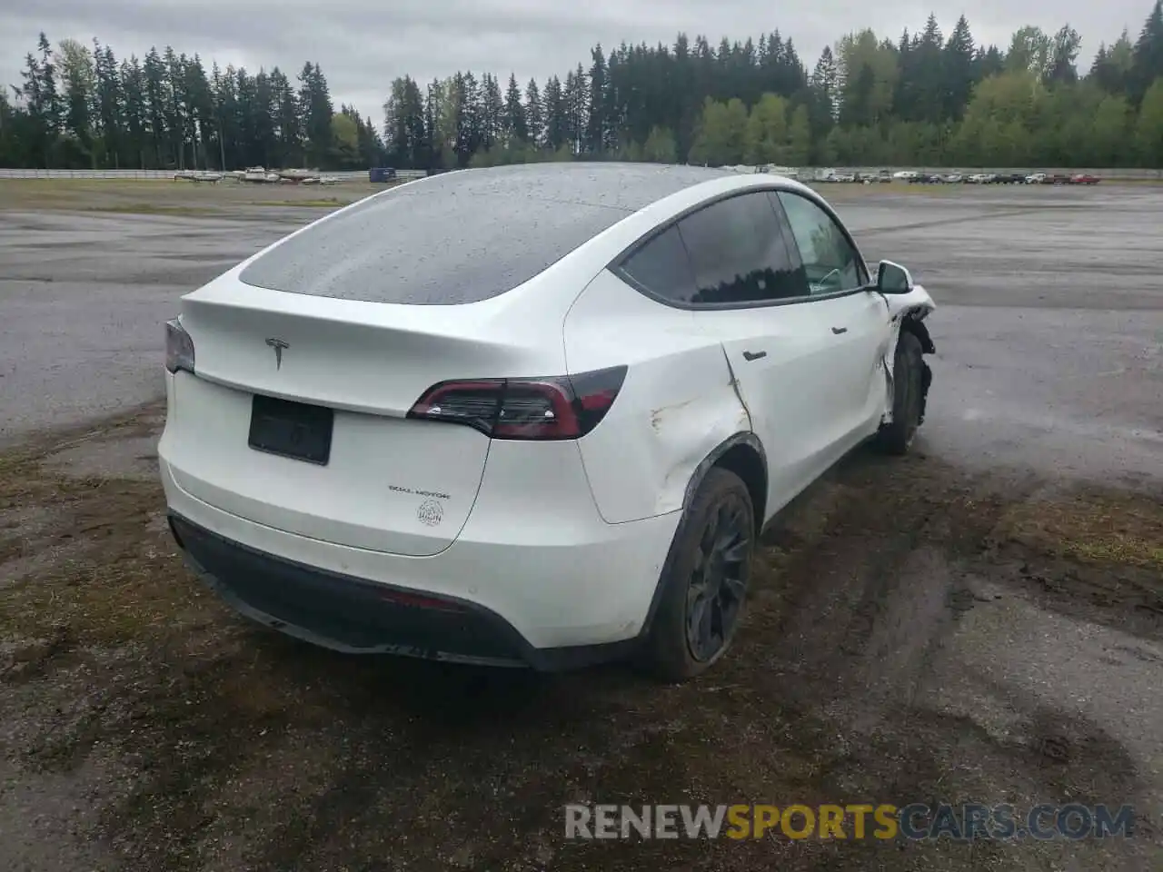 4 Photograph of a damaged car 5YJYGDEE1MF277063 TESLA MODEL Y 2021