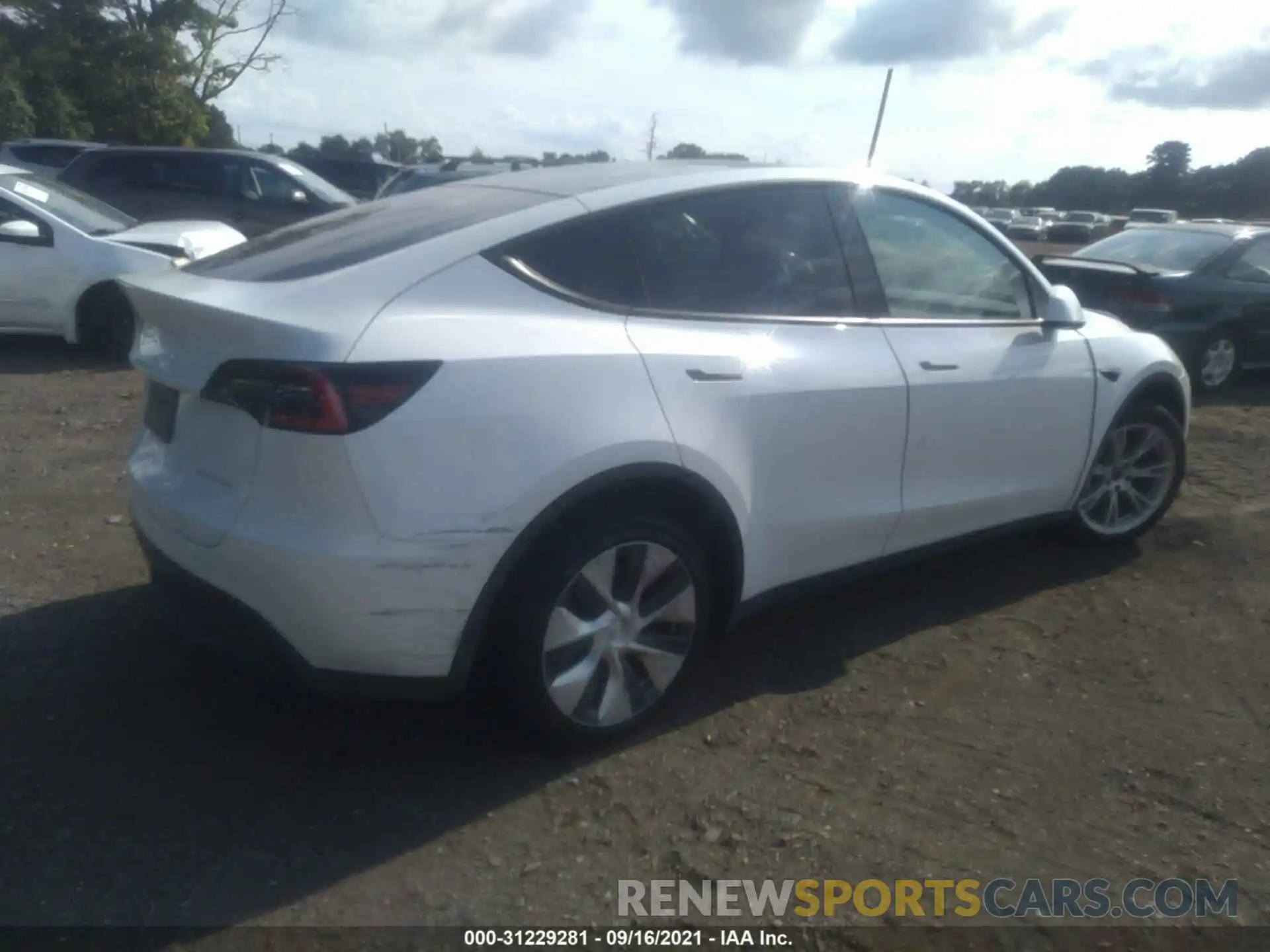 4 Photograph of a damaged car 5YJYGDEE2MF086199 TESLA MODEL Y 2021