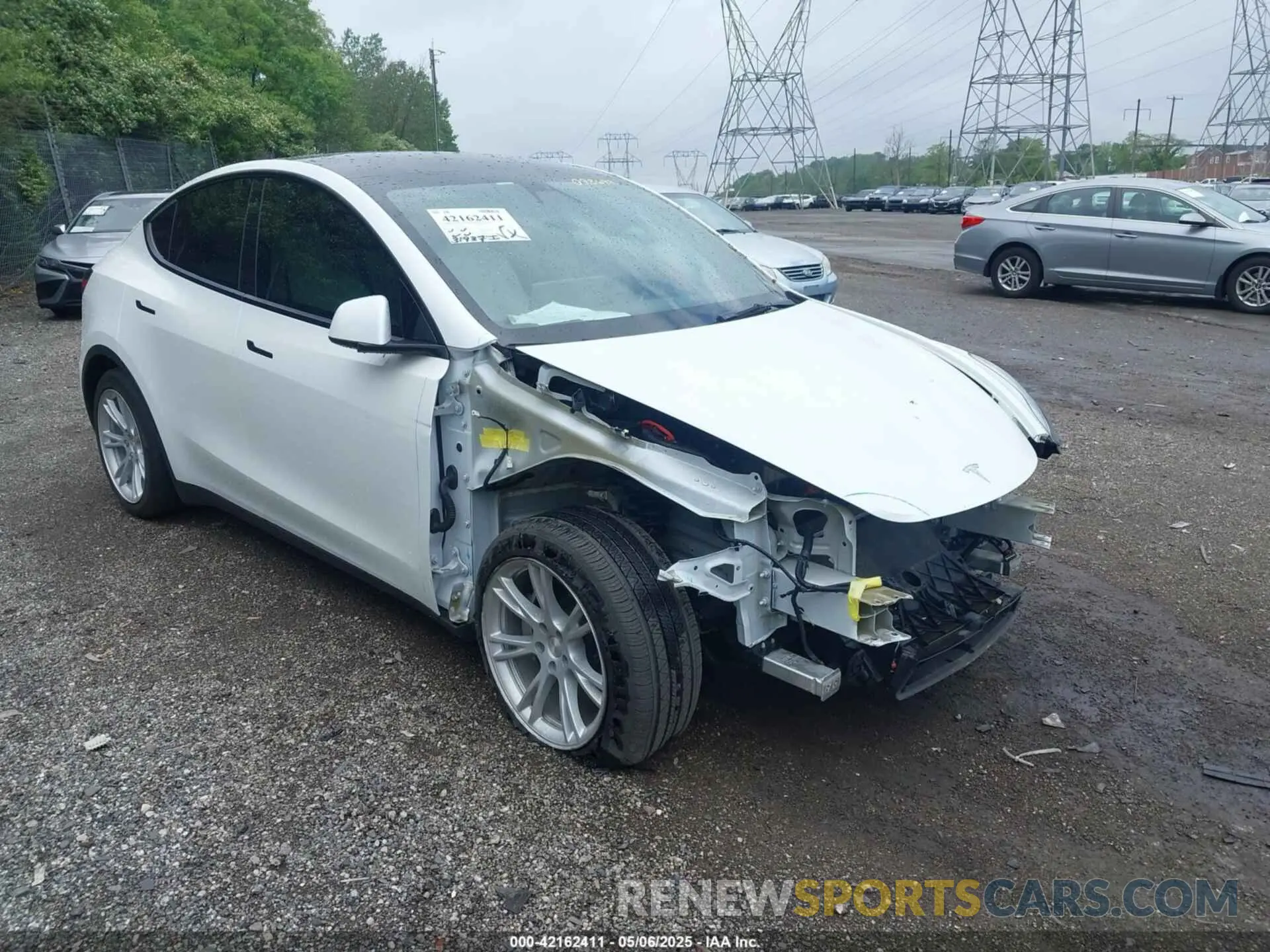 21 Photograph of a damaged car 5YJYGDEE2MF098692 TESLA MODEL Y 2021
