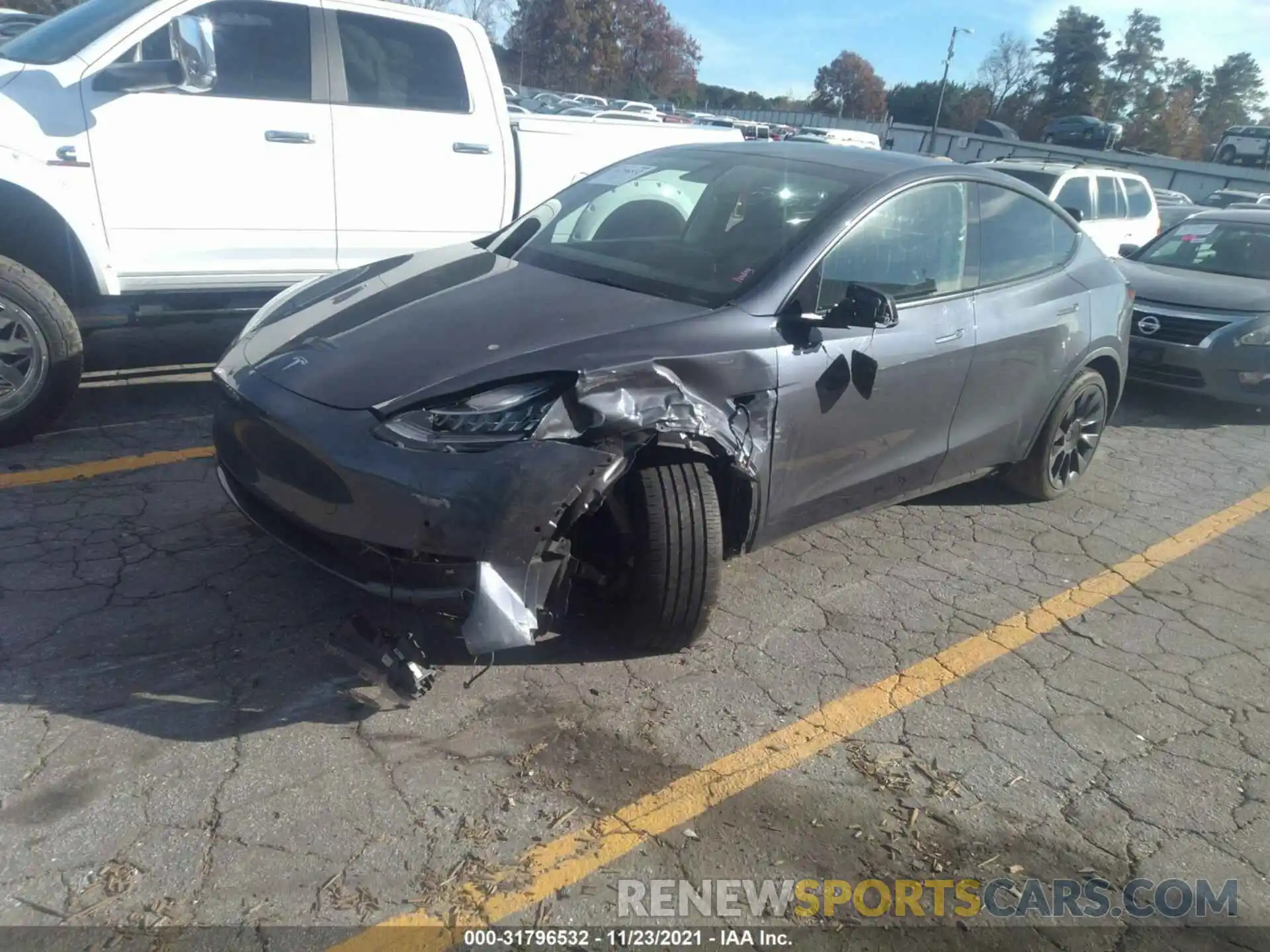 2 Photograph of a damaged car 5YJYGDEE2MF115460 TESLA MODEL Y 2021