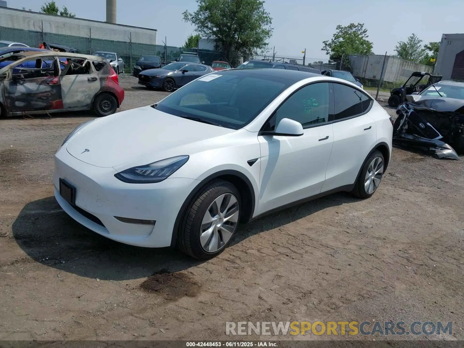 2 Photograph of a damaged car 5YJYGDEE2MF261874 TESLA MODEL Y 2021