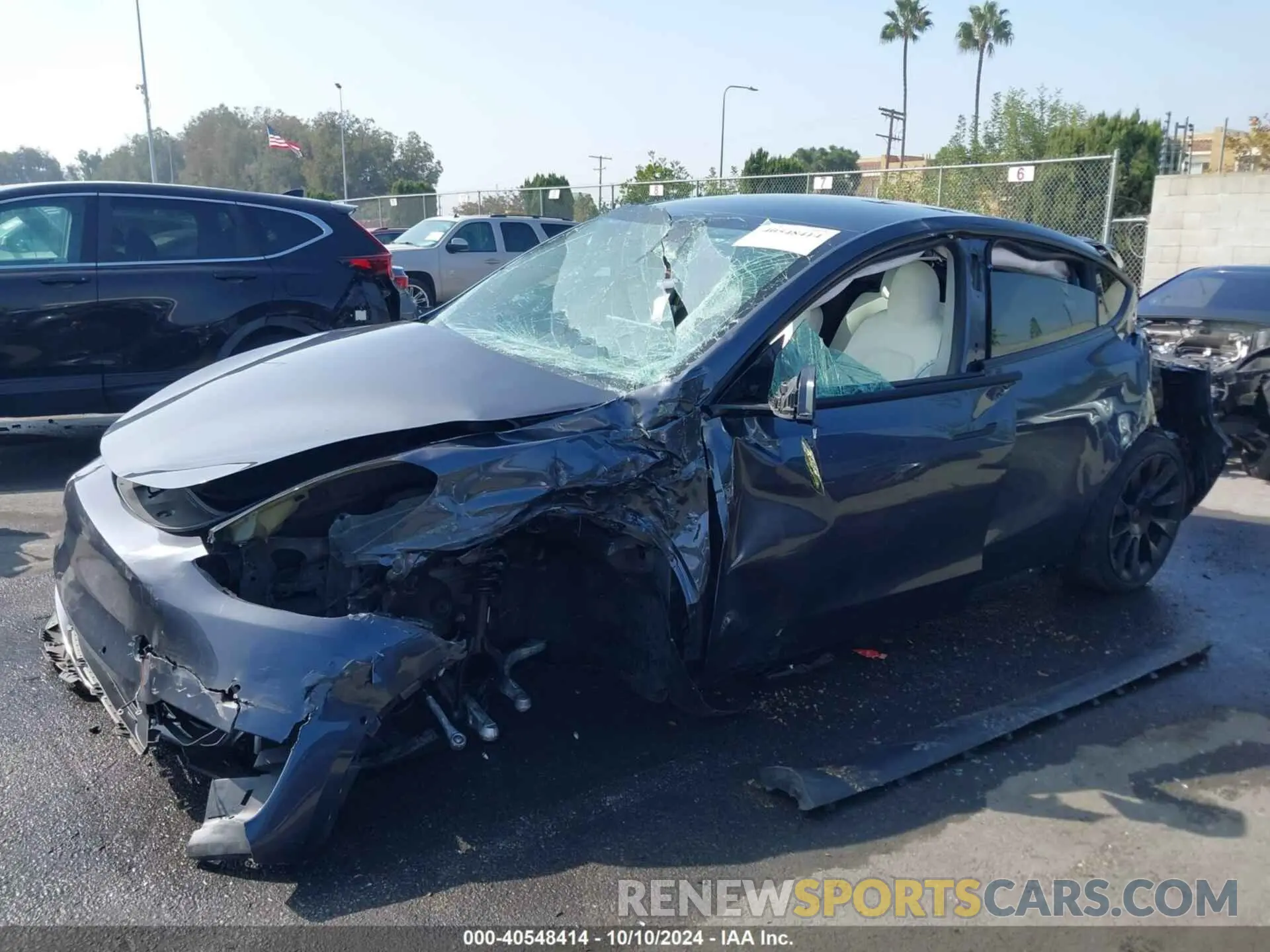 14 Photograph of a damaged car 5YJYGDEE3MF098040 TESLA MODEL Y 2021