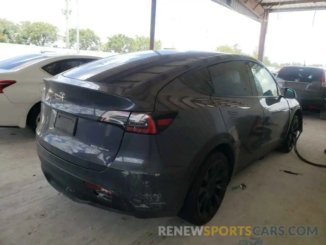 4 Photograph of a damaged car 5YJYGDEE3MF191561 TESLA MODEL Y 2021